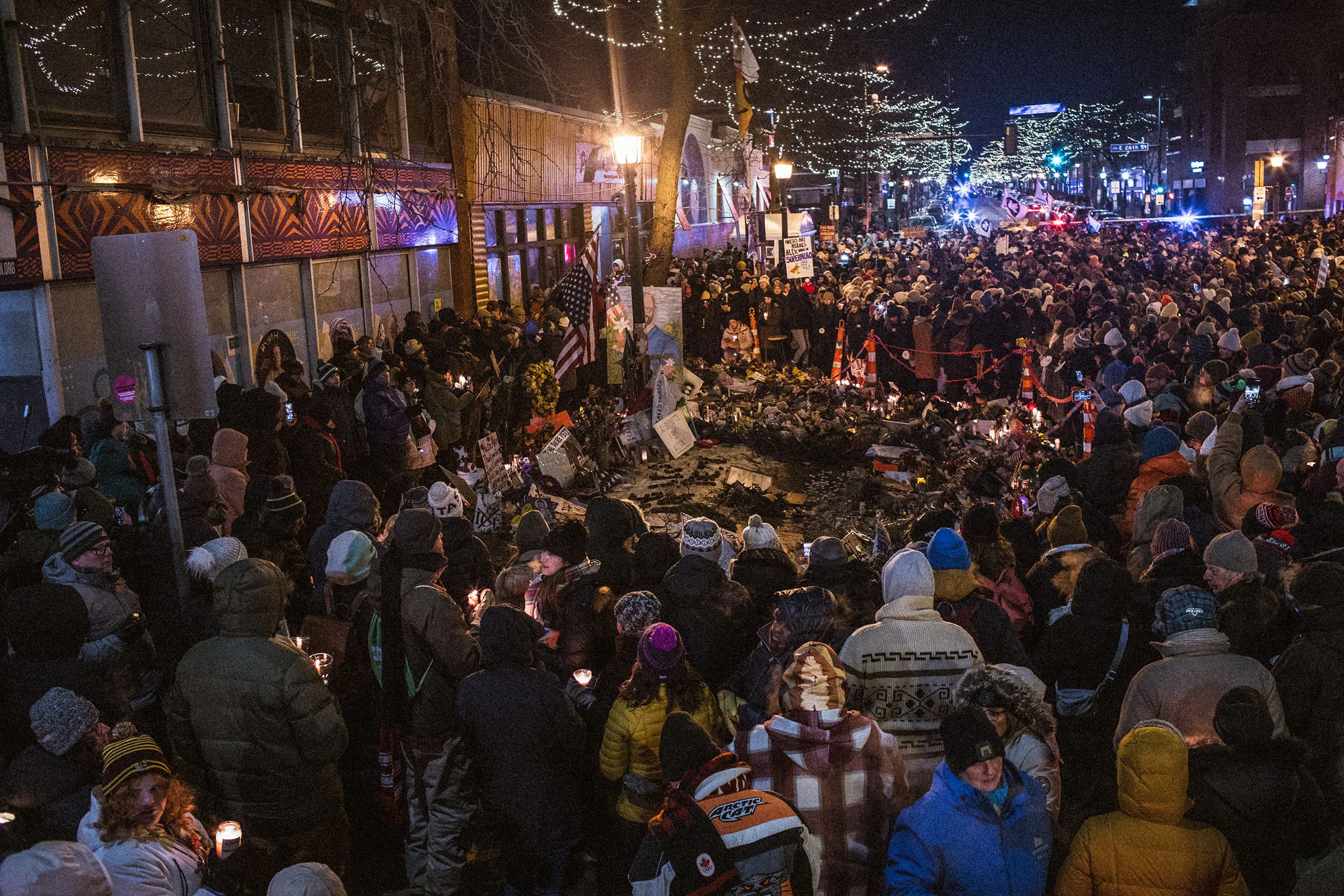 Crowds gather at a vigil for Alex Pretti who was fatally shot and killed by federal ICE agents in Minneapolis, Minnesota, Jan. 26, 2026. Erin Trieb for TIME