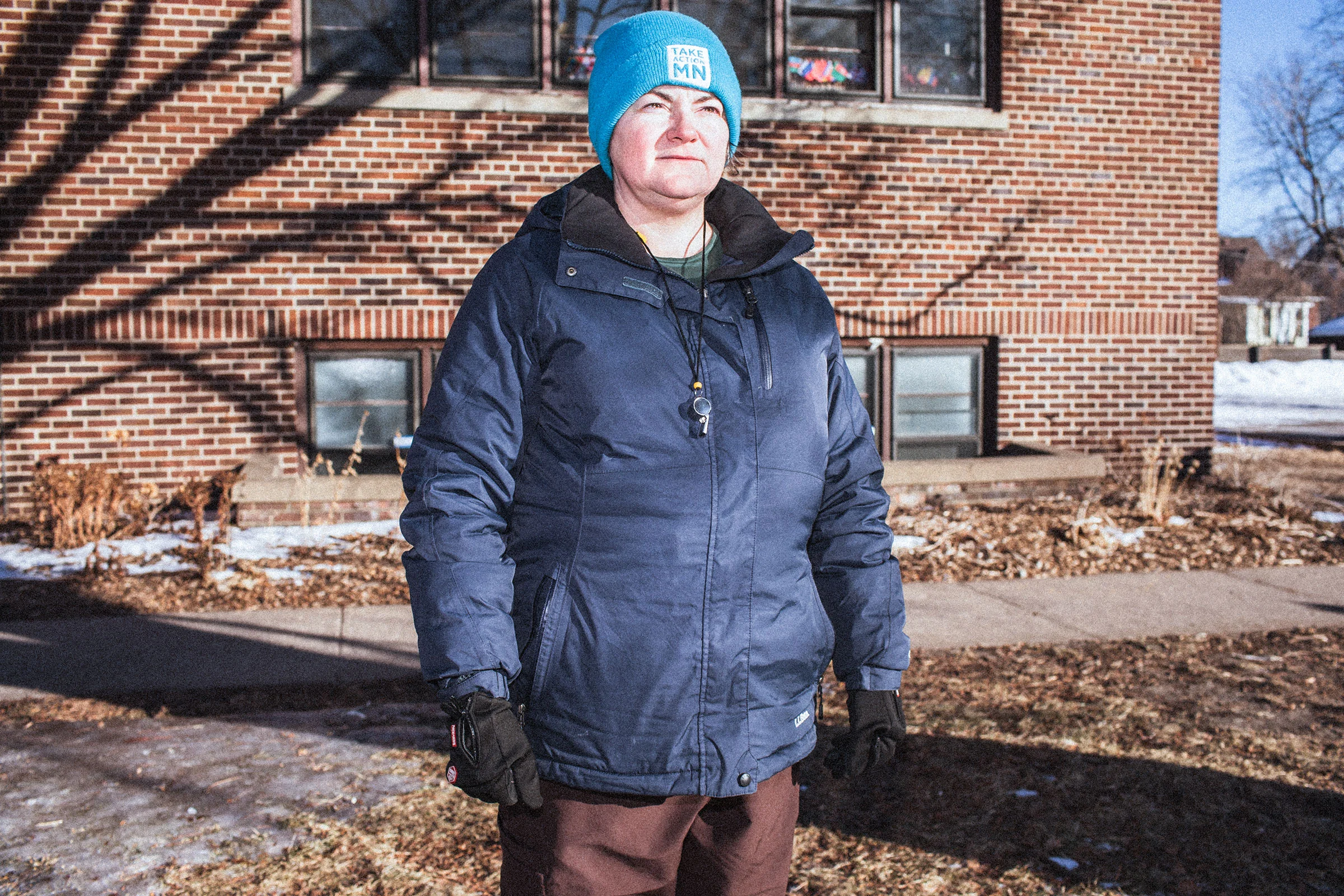 Amanda Otero patrols with a whistle outside her child's school, to watch for ICE agents; Minneapolis, Minnesota, Jan. 26, 2026. Erin Trieb for TIME