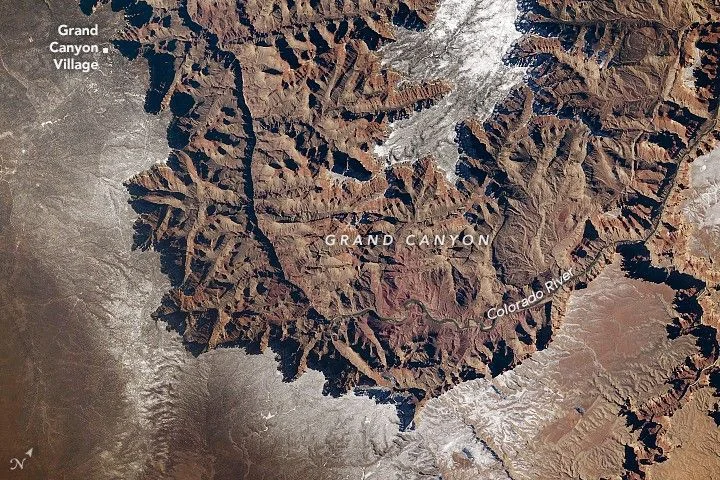 A Grand, Snow-Rimmed Canyon